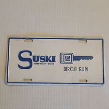 Vintage 'Suski Chevrolet Buick' Dealership Metal Novelty License Plate Birch Run picture