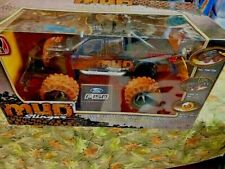 MUD SLINGER  RADIO CONTROLED  MUD TRUCK NEW IN BOX  picture