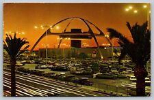 LAX Airport Theme Building at night - Los Angeles, Ca. vintage postcard picture