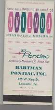 Matchbook Cover - 1957 Pontiac Dealer Hartman Pontiac Lancaster, PA picture