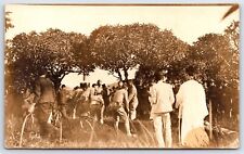 Postcard RPPC Military Funeral Lowering Coffin Into Ground Priest 1910s AP10 picture