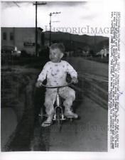 1959 Press Photo J. Hayden aka Sky King drives his new tricycle toy in highway picture