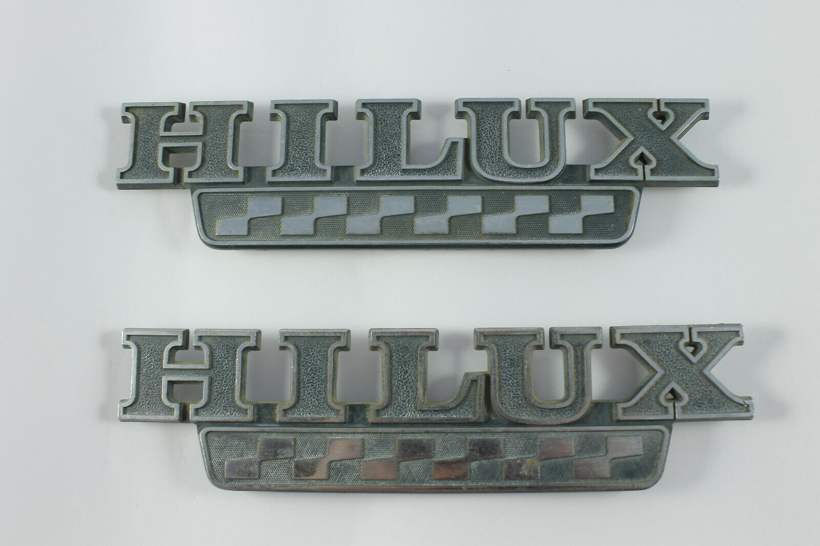 Original Pair of Toyota Hilux Pickup Front Fender Emblems, Good Cond.