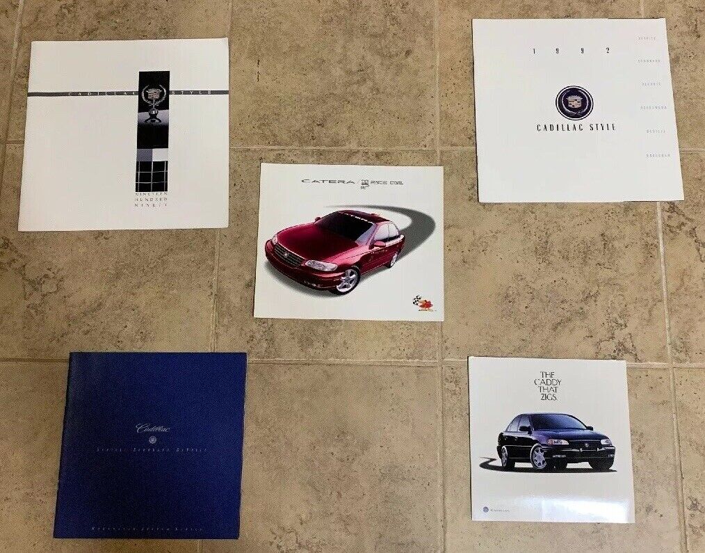 Lot of 1990/92/97 Cadillac Brochures and Ad Card