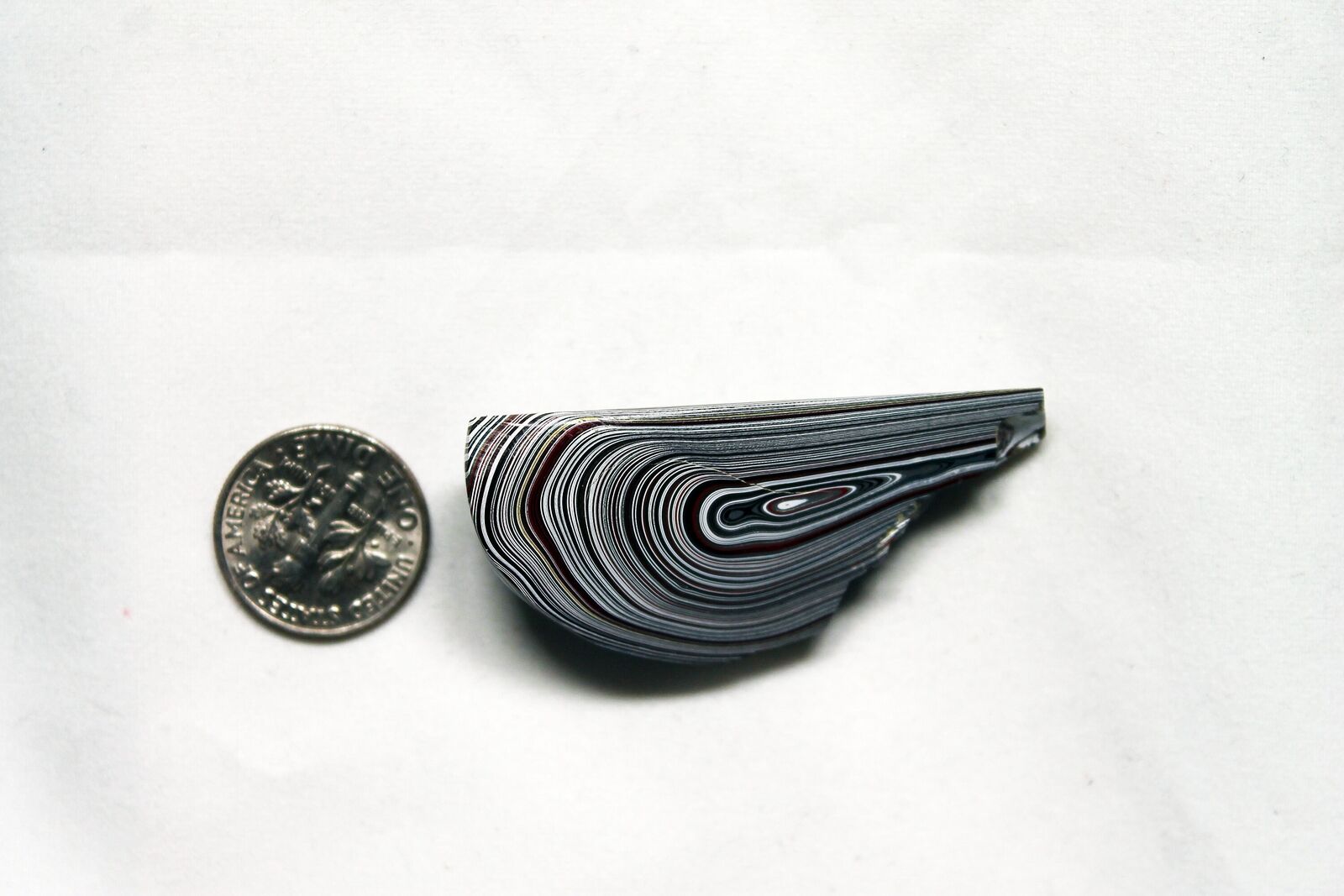 Finished Piece of Fordite - 42.43mm x 22.39mm x 5mm     (2334)