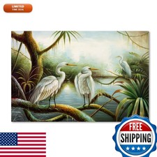 Trademark Fine Art Three Herons Canvas Art 16x24 picture