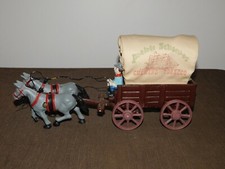 VINTAGE CAST IRON PRAIRIE SCHOONER CHEWING TOBACCO  HORSE & WAGON picture