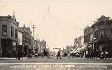 H57/ Fergus Falls Minnesota RPPC Postcard c1910 Lincoln Ave Stores Sign 181 picture