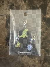 Pokemon Center Tyranitar, Pupitar, & Larvitar Metal Charm Evolution Set New picture