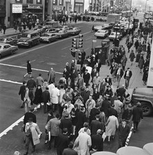 1960s Crowd crossing street at busy intersection Historic Old Photo picture
