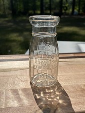 Vintage Universal Store 5 Cent Half Pint Milk Bottle, Embossed Clear Glass picture