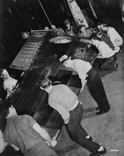 High angle view a group men supporting wing aircraft manufacture a- Old Photo picture