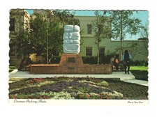 Downtown Acreage AK flowers & sculpture in front of City Hall VTG postcard Unp picture
