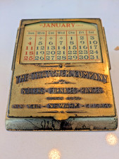 Vintage 1920s Brass J.E. Mergott Thatcher Co. Perpetual Calendar Clip picture