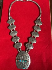 large Native American silver necklace scenes of Navaho hogan and desert land, picture