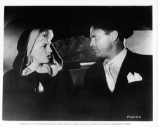 Jane Russell looking over at man back of car The Fuzzy Pink Nightg- Old Photo picture