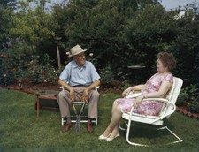 An old man a pair shears takes a break from pruning sit contentedl- Old Photo picture