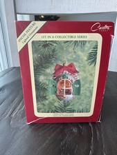 Carlton Cards Heirloom Ornament 1st in Series Pinecone Cottage Snug In Their Bed picture