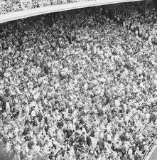 1960s Crowd of sports fans in stadium overhead view Historic Old Photo picture