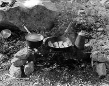 Bacon In A Frying Pan And Other Cooking Items Over A Camp Fire 191 - Old Photo picture