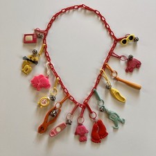 Vintage 80s Plastic Clip On Bell Charm Necklace 12 Charms picture
