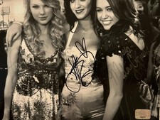 Katy Perry/Miley Cyrus/Taylor Swift Autographed Photo With COA 8x10 picture