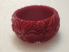 Vintage Cherry Red Bakelite Bangle Bracelet with a carved floral design picture