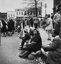 People sit curb after Mule Day parade Columbia Tennessee April 194- Old Photo picture