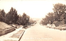 Real Photo Birds Eye View Main St Minot ND North Dakota RPPC c1925 Postcard picture