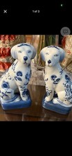 Staffordshire-style figurines featuring a hand-painted floral motif. picture