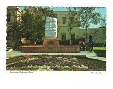 Downtown Acreage AK flowers and sculpture in front of City Hall VTG postcard Unp picture