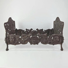 Antique Victorian Cast Iron doll bed with Cherub Face & Ornate Scrollwork picture