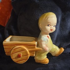 Vintage Boy Pulling A Wheelbarrow Ceramic Planter Figurine 6” x 7.5” free stand picture