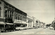 RPPC Maquoketa Iowa Main Street facing North Hinckley Drug 1959 real photo PC picture