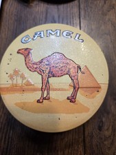 Vintage 1993 Camel Beast Silhouette Matte Black Zippo Lighter with Original Tin picture