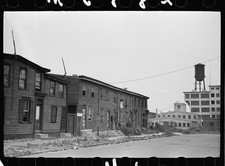 Photo:1930s Row Houses Water Tower Urban Street Scene picture