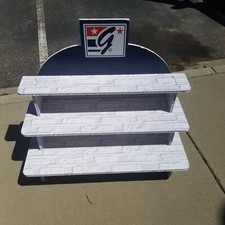 The Game Hat Display Store Advertising 32