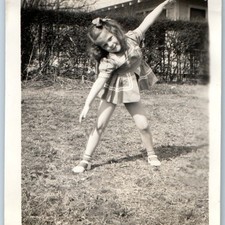c1940s Cute Girl Dancing Posing Yard Snapshot Photo Hair Bow House Dress Vtg picture