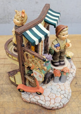 Hummel Blooming Delights With Boy and Girl Holding Flowers Figure Set picture