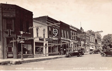 RPPC Glenwood Iowa Main Street John Deere Store Advertising Photo Postcard D22 picture