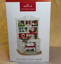 Signed Hallmark Ornament - Mrs. Claus’s Sewing Cabinet picture