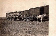Park City Montana 1907 NP RR being loaded off wagon RPPC Photo Postcard COPY picture