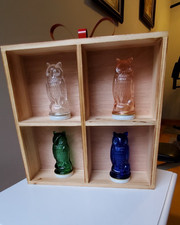 4 Vintage Victory Glass Owls, with a natural wood tabletop cubby picture