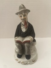 Vintage Deville Old Man Sitting On Bench Smoking Pipe And Reading picture