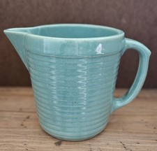 Vintage Manmouth Teal Glazed Ceramic Pitcher. 5 1/2