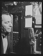 Photo:Man Peering Into Control Panel DONT TOUCH 1900s Industrial Interior picture