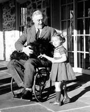 President Franklin D. Roosevelt with a little girl 8
