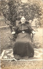 WIDOW LADY BLACK DRESS c1910 real photo postcard rppc candid family portrait mom picture