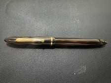 vintage gold-colored fountain pen nib marked