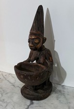 YORUBA PEOPLE CARVED WOOD STATUE OF A KNEELING FEMALE WITH AN OFFERING BOWL picture